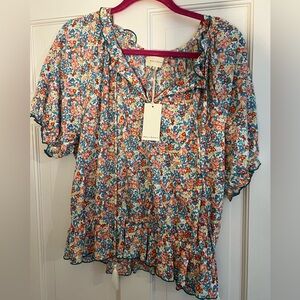 Melody’s ruffle sleeved floral blouse, NWT